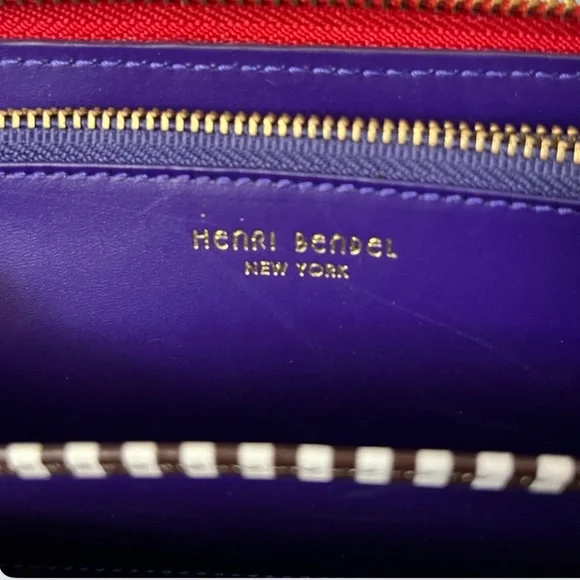 Henri Bendel red quilted wallet with a gold-tone logo. - Picture 8 of 16